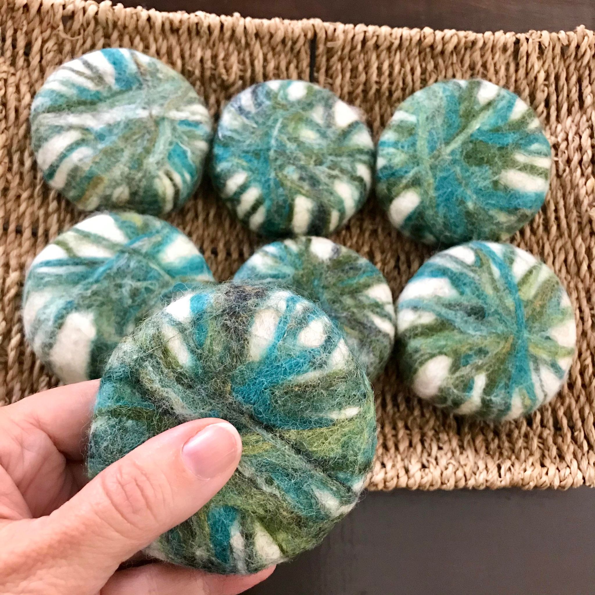 Round Simply Natural Canada cedar fir essential oil natural soap made in Canada with local apple wine and hand felted in shades of green and white