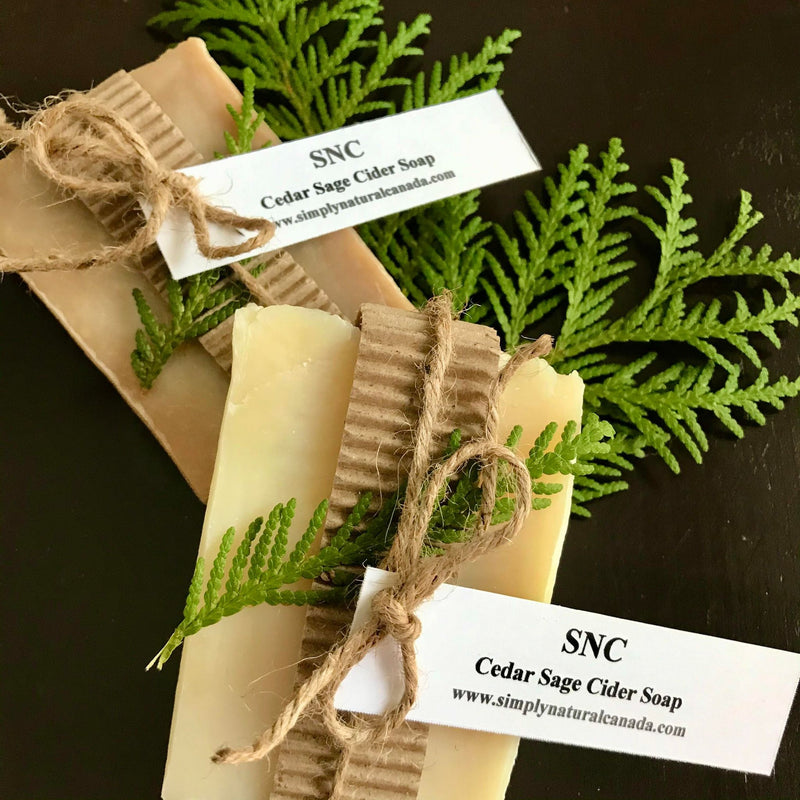 canadian made simply natural canada cedar sage cider soap with a piece of fresh cedar on top