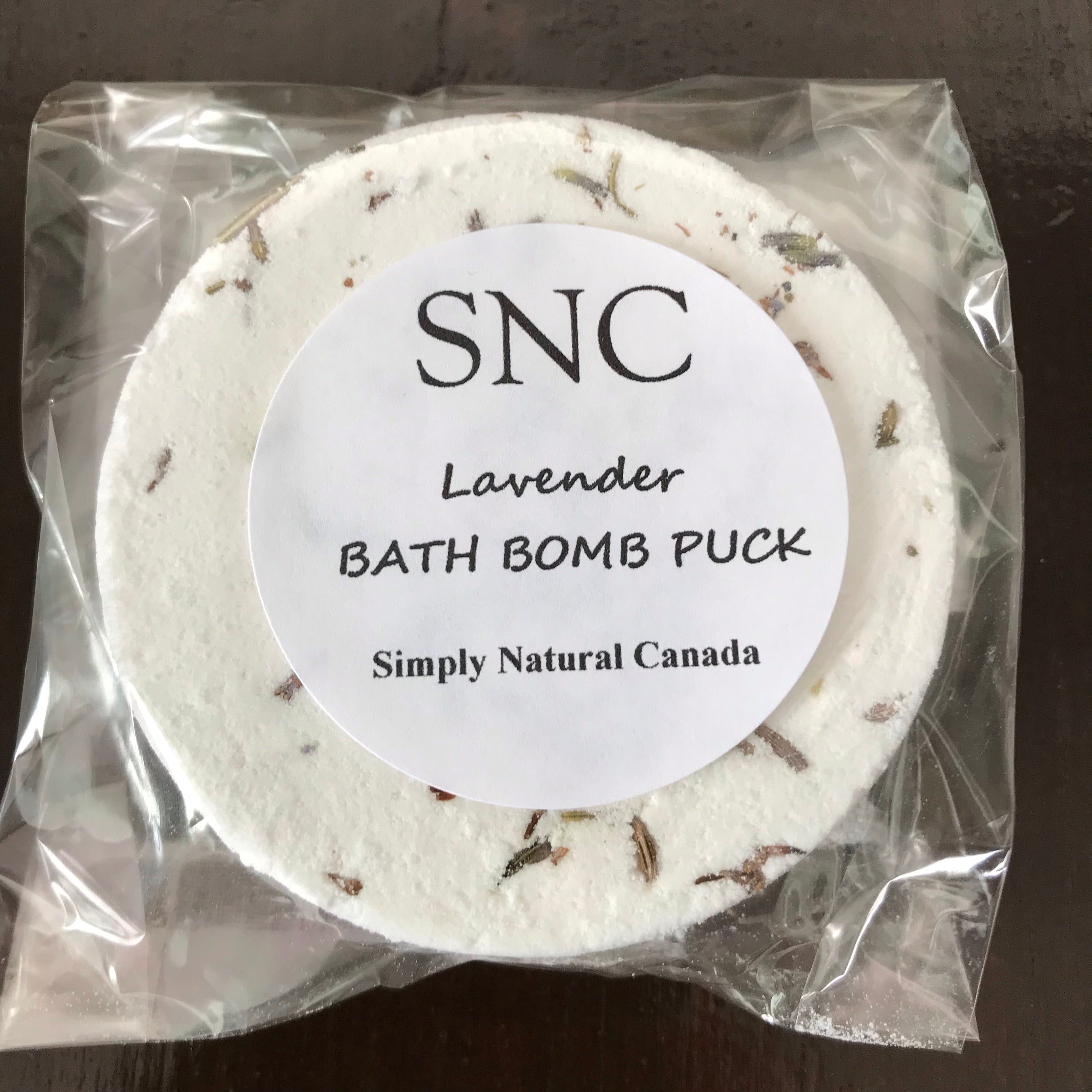 natural lavender essential oil bath bomb puck made in canada in clear compostable wrap