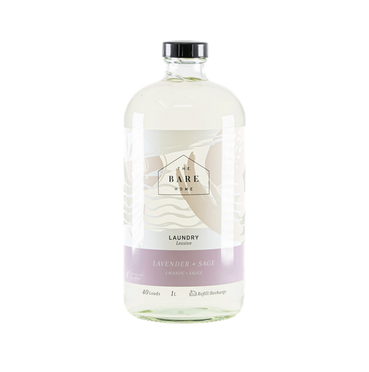 Lavender sage essential oil scented natural liquid laundry detergent in a 946 ml refillable glass bottle made in Canada by The Bare Home company based in Ontario