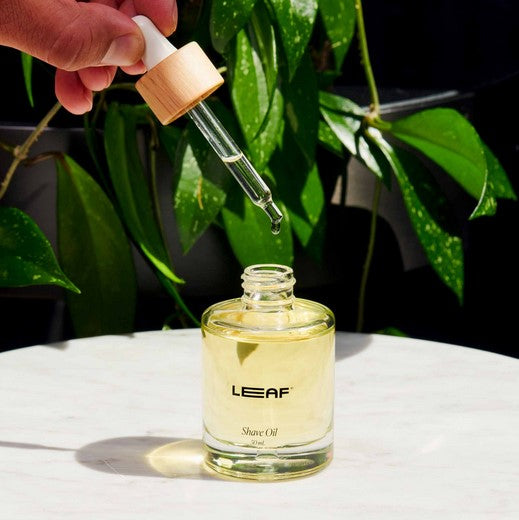 This unscented Leaf Shave Oil in a glass bottle with dropper is made of a blend of oils that help to protect your skin and lock in moisture, while providing extra glide for your shave.