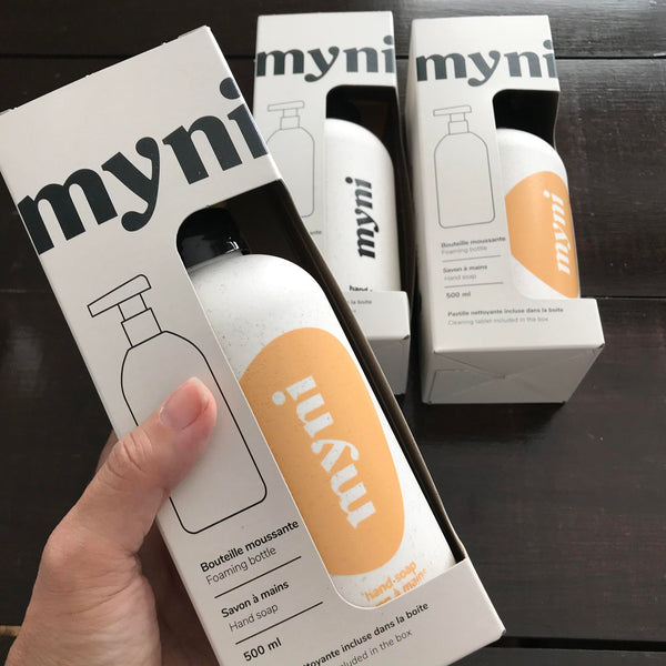 Myni yellow and white reusable wheat straw foaming hand soap bottle with complimentary unscented foaming hand soap concentrate tablet made in Canada