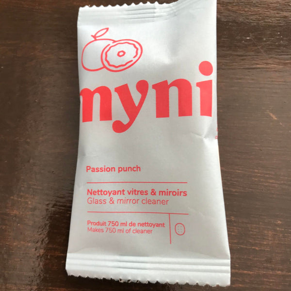 Passion Punch grapefruit mango scented glass and mirror cleaner cleaning tablet concentrate in a compostable pouch made in canada by myni