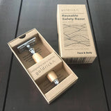 reusable olive wood and chrome safety razor in a box with a complimentary blade