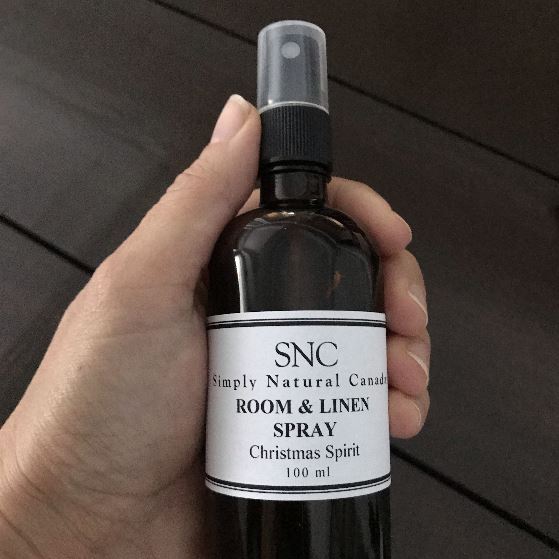 natural christmas spirit essential oil blend room and linen in a 100 ml amber glass bottle with black spray top made in canada by simply natural canada