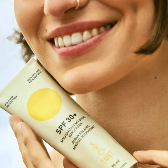 Moisturizing mineral sunscreen from Tanit Botanics in a 90 ml aluminum tube is made in Canada with mineral filters, precious organic oils and natural butters to protect and moisturize the skin safely, without any harm to marine life 